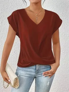 Elegant rust red V-neck T-shirt with stylish front twist detail and textured fabric.