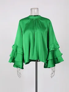 Elegant green satin blouse with tiered ruffle sleeves and a mock neck for women.