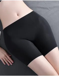 Close-up of black seamless hip enhancer shorts showing smooth contouring effect