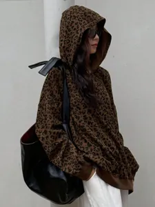Detailed view of the vintage leopard print corduroy hoodie featuring an oversized hood