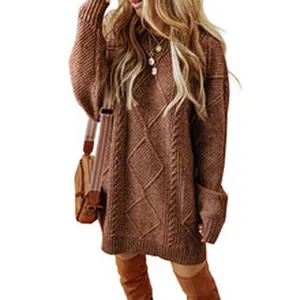 Detailed macro view of chunky cable-knit texture on brown oversized sweater dress