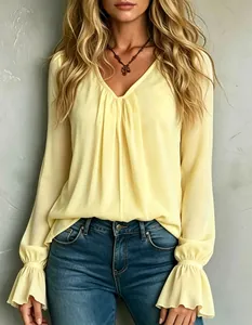 Elegant yellow V-neck pleated long sleeve chiffon blouse shown in a high-quality detail view