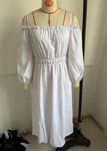 White cotton linen off-shoulder maxi dress featuring puff sleeves and elastic waist