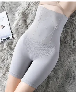 Detailed view of grey high-waisted seamless tummy control shorts with honeycomb knit