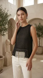 Elegant black beaded sleeveless top with fringe detail for a sophisticated look