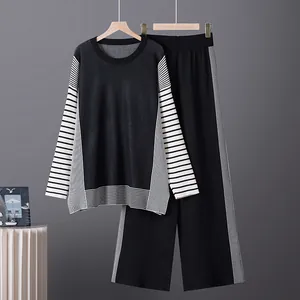 Stylish women's two-piece knit set featuring striped long-sleeve top and wide-leg pants