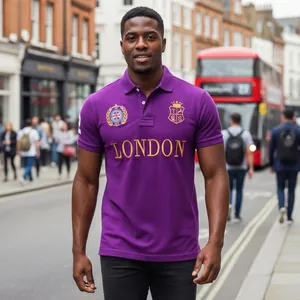 Detailed view of men's purple polo shirt with London embroidery on a city street