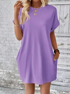 Stylish purple crewneck loose fit short sleeve T-shirt dress featuring side pockets