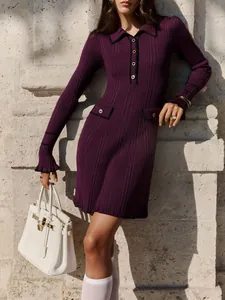 Elegant detail of purple ribbed knit dress with lapel and black contrast trim detail