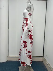 Side profile detail of an elegant white sleeveless maxi dress with red floral print.