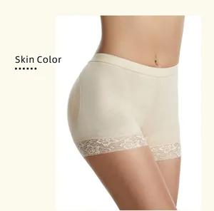 Detailed macro view of skin color hip-enhancing shaper shorts with delicate lace trim