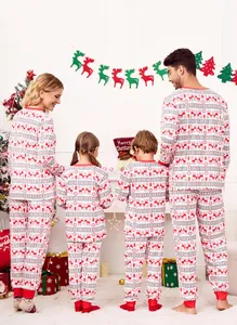 Detailed view of matching family Christmas pajamas with festive red reindeer prints.