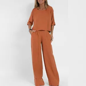 Zweiteiliges Damen-Set aus Baumwollleinen in Rostorange mit Kurzarm-Top und weiter Hose