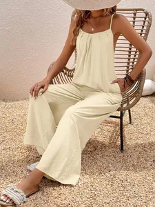 Tuta estiva da donna beige chiaro stile resort con spalline sottili e gamba larga