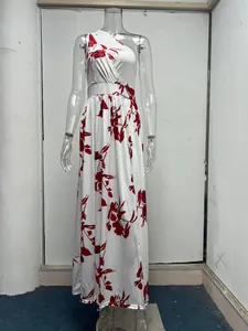 Elegant white one-shoulder maxi dress with red floral print displayed on mannequin