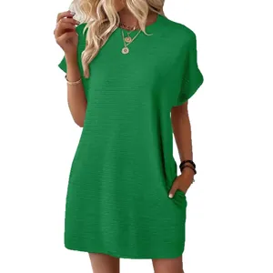 Stylish green loose-fit short sleeve summer dress with round neck and side pockets