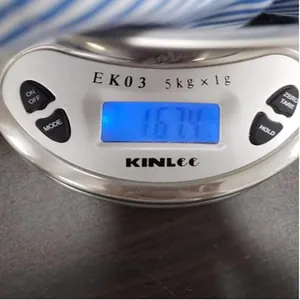 Detailed view showing the 167.4g weight of this blue striped long sleeve shirt
