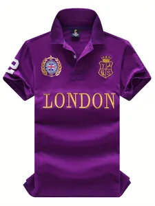Detail view of men's purple cotton Polo shirt with gold London embroidery and UK crest.