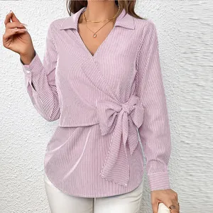Elegant women's pink vertical striped long sleeve blouse featuring a waist tie knot detail