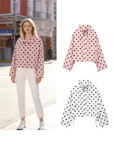 Stylish women's polka dot jacket with high collar and adjustable drawstring hem