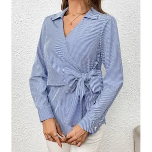 Elegant blue vertical striped long-sleeve blouse with stylish side-tie bow detail