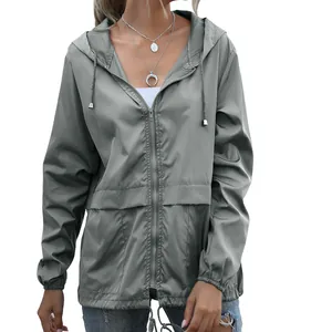 Women's lightweight grey hooded rain jacket windbreaker for outdoor hiking and travel