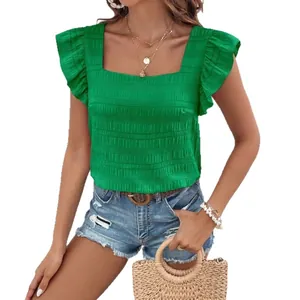 Elegant green square neck blouse featuring ruffle sleeves and detailed smocked fabric texture