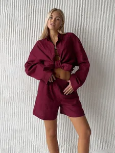 Chic burgundy cotton two-piece loungewear set with long sleeve tied shirt and shorts