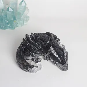 Close-up showing the intricate crystal texture of the black resin dragon figurine