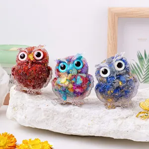 Decorative handmade resin owl figurines with natural crystal gravel for home office.