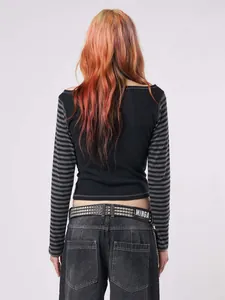Back view of a black cropped t-shirt with grey striped long sleeves for women. (80 chars)