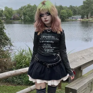 Alternative style long sleeve tee featuring striped sleeves and chest print detail