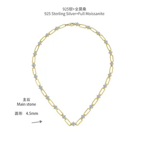 Detail of 4.5mm round Moissanite pendant on a 925 sterling silver gold-plated paperclip chain