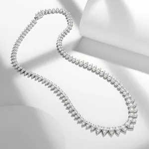 Close-up of pear-cut moissanite stones on a gleaming S925 silver-plated necklace