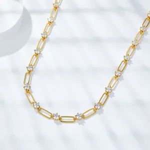 Detailed macro shot of 18k gold-plated silver paperclip necklace with Moissanite stones