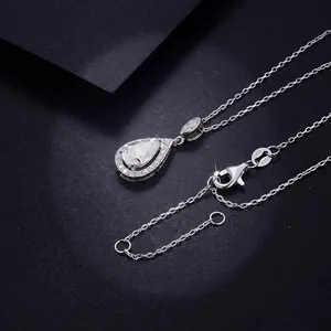 Close-up of pear-shaped 1.5ct moissanite pendant on S925 sterling silver chain.