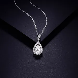 Macro close-up of a pear-shaped 1.5 carat moissanite pendant on an S925 silver chain