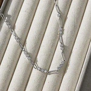Close-up detail of S925 sterling silver paperclip link necklace with 3.0mm round moissanite