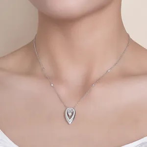 Elegant 1.5ct teardrop moissanite necklace in S925 silver worn by model, detail view