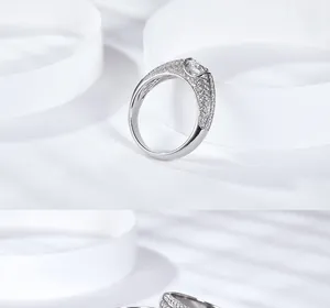 Detailed view of a luxurious men's silver ring with full moissanite pavé setting.