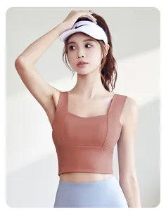 Soutien-gorge de sport yoga orange sans couture avec larges bretelles sur mannequin
