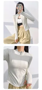 Détail de la veste de yoga à fermeture éclair côtelée et ajustée pour sport féminin