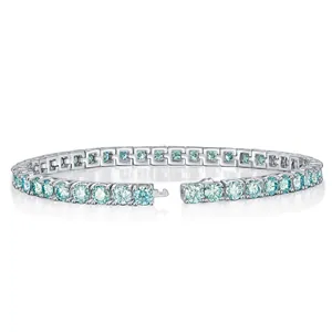 Silver tennis bracelet with 50pt light blue moissanite stones in four-prong settings.