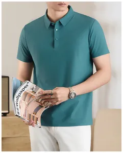 Male model wearing a premium teal ice silk polo shirt for a business casual look