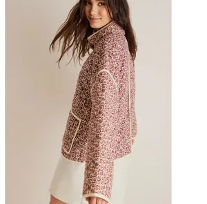 Side view detail of stylish floral quilted cotton jacket featuring a loose fit