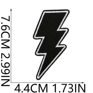 Macro detail of black lightning bolt embroidered patch with 7.6cm height measurements