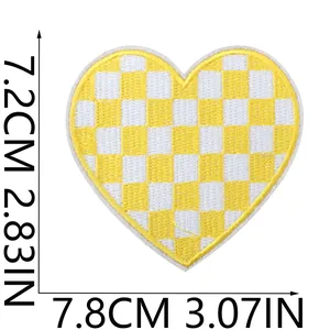 Dimensions of heart-shaped yellow and white checkerboard embroidered iron-on patch