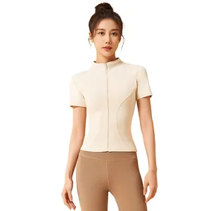 Professional slim fit women's summer yoga set featuring zip-up short sleeve top and leggings.