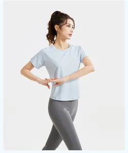 Activewear set featuring a light blue short sleeve shirt and grey high waist leggings