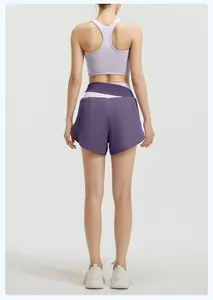Rear view detail of a lavender sports bra and layered purple athletic shorts set